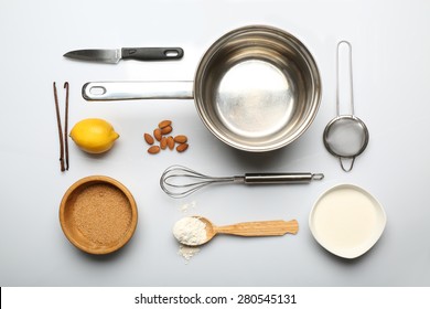 Food Ingredients And Kitchen Utensils For Cooking Isolated On White