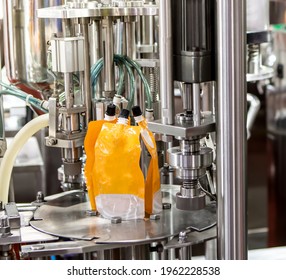 Food Liquid Nozzle Packaging Machine. Orange Juice Pouch Filling Machine. Food Industry