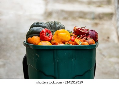 Food Loss At The Farm Or Market. Spoiled Unsold Rotten Fruits In The Trash. Discarded Rotten Fruits And Vegetables. Reducing Food Waste Concept