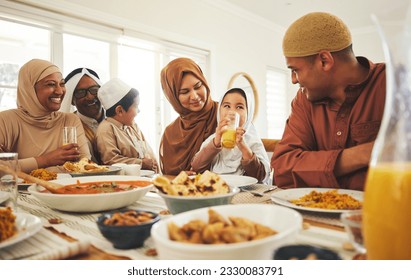 Food, love and muslim with big family at table for eid mubarak, Islamic celebration and lunch. Ramadan festival, culture and iftar with people eating at home for fasting, islam and religion holiday - Powered by Shutterstock