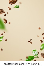 Food Mockup With Flying Coffee Beans And Leaves On A Beige Background With Copy Space.