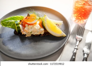 Food, New Nordic Cuisine, Culinary And Cooking Concept - Close Up Of Toast Skagen With Shrimps, Fish Roe And Buttery Bread On Plate