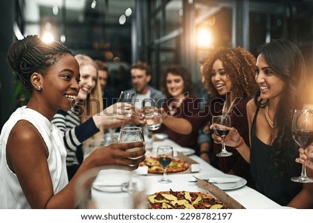 Food, party and wine with friends at restaurant for celebration, pizza and social event. Happy, diversity and toast with group of people eating together for fine dining, cheers and free time Foto stock © 