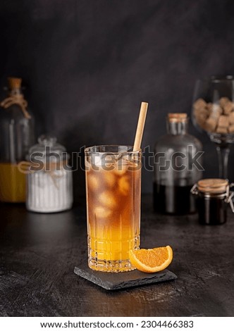 Food photography of coffee with orange juice, bumblebee, ice, drink, beverage, refreshment, sugar, straw, cool,  freshness, aroma