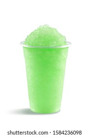 Food photography of lime slushy slushie frappe in a plastic cup on a white background