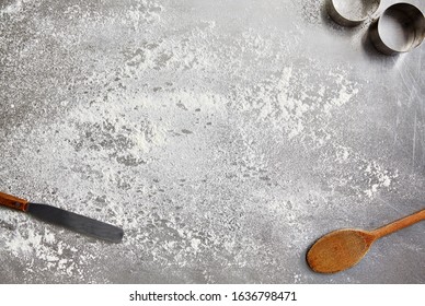 Food Photography Of A Metal Kitchen Surface With Flour And Baking Equipment