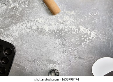 Food Photography Of A Metal Kitchen Surface With Flour And Baking Equipment