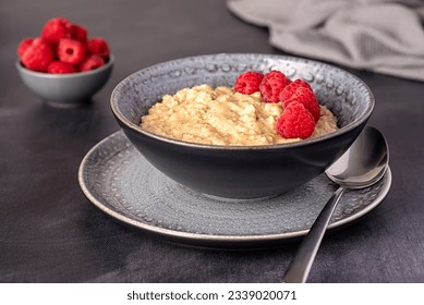 Food photography of oatmeal, porridge, raspberry, fibre, ripe, vegan, wholegrain, lifestyle, dish, berry, homemade