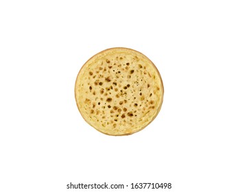 Food Photography Of A Plain Untoasted English Or Australian Crumpet On A White Background