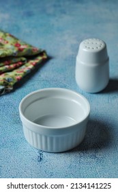 Food Photography Set Up At Home.   White Tableware, Flower Napkin And Blue Wooden Table