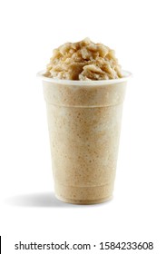 Food photography of slushie or frappe: red bean Asian flavour in a plastic cup on a white background