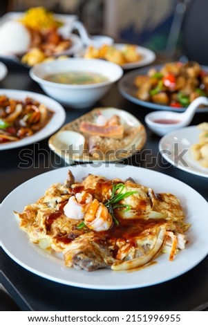Food platter combo set of traditional Cantonese yum-cha Asian gourmet cuisine meal food dish on the white serving plate on the table, includes dishes of duck, pork, fish, prawn chicken omelette