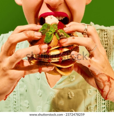 Food pop art photography. Close up cropped portrait of woman eating delicious, sweet pancakes in jam. Vintage, retro 80s, 70s style. Complementary colors. Concept of food, fashion, style, taste. Ad