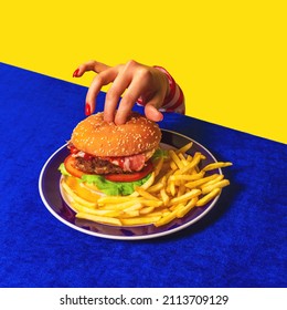 Food pop art photography. Female hand and hamburger, french fries on bright blue tablecloth isolated on yellow background. Vintage, retro 80s, 70s style. Fast food. Copy space for ad, text - Shutterstock ID 2113709129