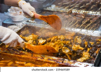 Food Preperation At A Night Market In Myeong-dong, Seoul, South Korea.