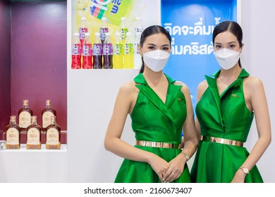 Food Products Free Sample Promote Girl Pritty Woman Model To Customer Walk In Food Expo Festival Event Hall.25 May 2022.Bangkok,THAILAND.