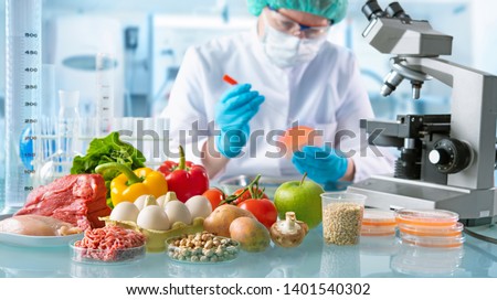 Food quality control expert inspecting specimens of groceries in the laboratory