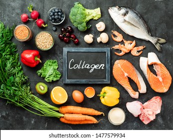 Food rich in collagen. Various food ingredients and chalkboard with Collagen letters over dark background. Top view or flat lay