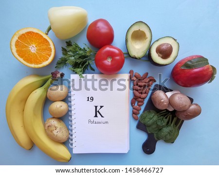Food rich in potassium with the symbol K and atomic number 19. Natural products containing potassium, dietary fiber and minerals. Healthy sources of potassium. Stock foto © 