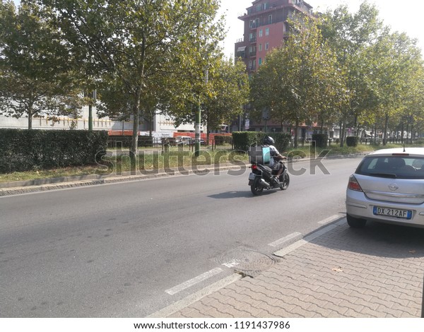 Food\
Riders in the Street of Milan,Italy-September\
2018