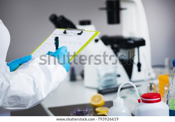 Food safety\
inspector working in\
laboratory