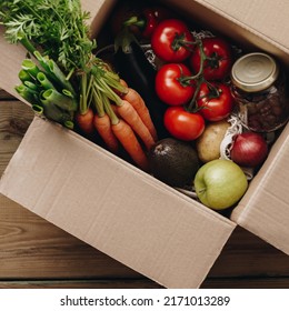Food Selection In Paper Box: Fruit, Vegetable, Herbs, Legumes, Cereals, Leaf Vegetable On Wooden Background. Healthy Food, Clean Eating, Dieting, Cooking Concept. Flat Lay Top View