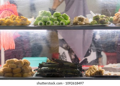 Food Seller Display Delicious And Colourful Malaysia Home Handmade Local Cakes Or KUEH For Sale In Food Stall Market