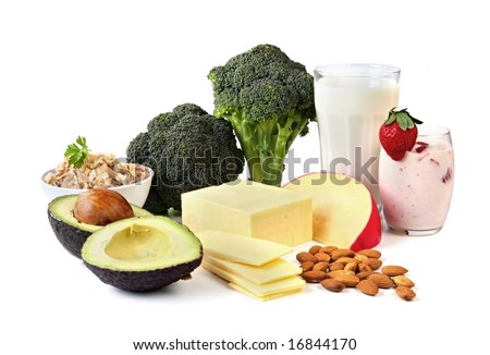 Food sources of calcium, isolated on white.  Includes milk, yogurt, almonds, cheeses, broccoli, salmon, and avocado.