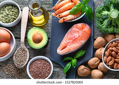 Food Sources Of Omega 3 And Healthy Fats. Foods High In Fatty Acids Including Seafood, Vegetables, Nut And Seeds
