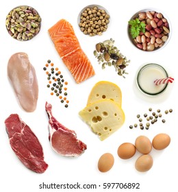 Food Sources Of Protein, Isolated, Top View.  Includes Meat, Fish, Dairy, Beans, Nuts And Seeds.