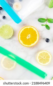 Food Storage Bags With Fresh Fruit And Vegetables, Overhead Shot On A White Marble Table. Summer Snacks In Containers With Zippers