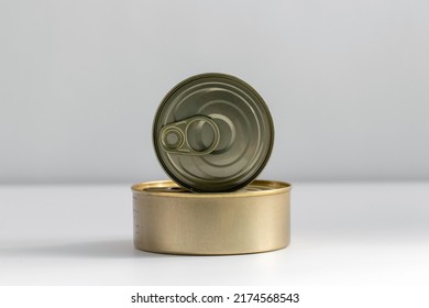 Food Storage Concept - Close Up Of Tin Cans With Preserves On Table