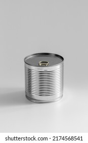 Food Storage And Eating Concept - Close Up Of Tin Can With Preserve On Table