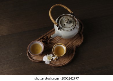 Food Styling Background Tea Set For Sweet Desserts Decoration. Closeup Wooden Tray Of Delicious Asian Cake With Tea Pot Decoration On Table