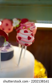 Food Styling In Bakery, Wedding Or Happy Valentine Colorful Lollypop Candies Decorated With Chocolate Hearts And Flowers