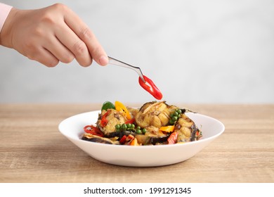 Food Stylist Use Tweezers Decorating Thai Food In White Dish