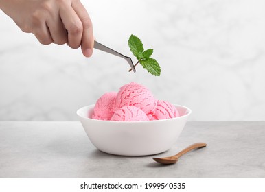 Food Stylist Use Tweezers Decorating Fake Icecream For Photography