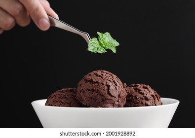 Food Stylist Use Tweezers Decorating Fake Icecream For Photography