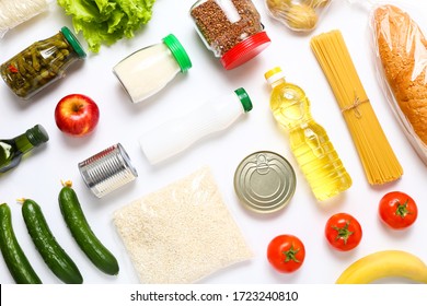 Food supplies for the period of quarantine on white background. Set of grocery items from canned food, vegetables, pasta, cereal. Food delivery concept. Donation concept. Top view. - Shutterstock ID 1723240810