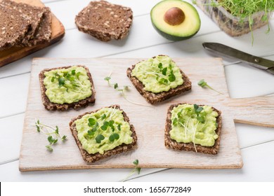 Food Swap. Ingredients For Sandwiches And Ready Vegetarian Snacks With Avocado Spread And Microgreen