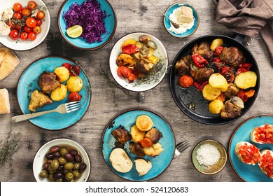 Food Table, Fried Meat With Vegetables In A Pan, Salad And Appetizers, Top View