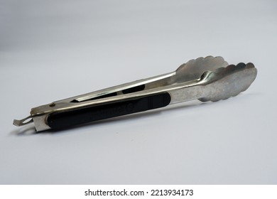 Food Tongs Made From Stainless. Isolated In White Background