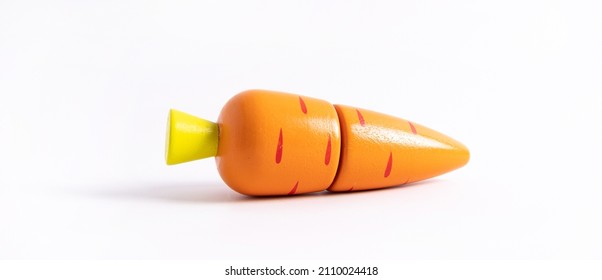 Food Toy Carrot On White Background. Creative Wooden Design, Vegetarian Vegetable . Child Development. Kids Play.