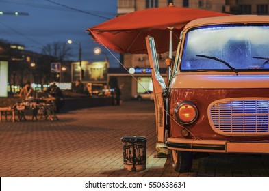 Food Truck On Wheels In Night Street