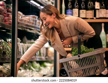 Food, Vegetables And Woman With Groceries, Shopping For Fresh, Organic And Healthy Products. Grocery, Supermarket And Female Consumer With Basket Buying, Reaching And Choosing Meal Ingredients