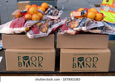 Food Is Waiting To Be Loaded Into The Trunk Of Vehicles During A Drive Thru Food Distribution By The Los Angeles Regional Food Bank In Glendora, Calif. Dce. 8, 2020.