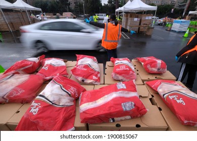 Food Is Waiting To Be Loaded Into The Trunk Of Vehicles During A Drive Thru Food Distribution By The Los Angeles Regional Food Bank At Exposition Park On Saturday, Jan. 23, 2021, In Los Angeles.