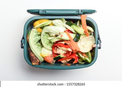 Food waste from domestic kitchen Responsible disposal of household food wastage in an environnmentally friendly way by recycling in compost bin at home - Shutterstock ID 1557328265