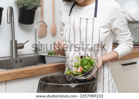Food waste environment concept, people throwing food garbage into bin prepare to decompose. [[stock_photo]] © 