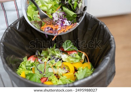 Food waste environment concept, people throwing food garbage into bin prepare to decompose.